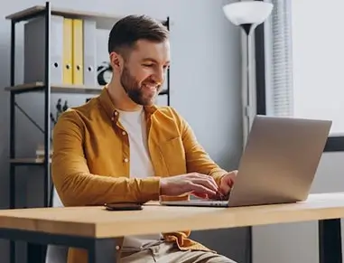 Guy Filling Put Form For Pet Insurance